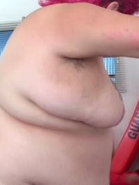 Ugly fat wench takes off her clothes